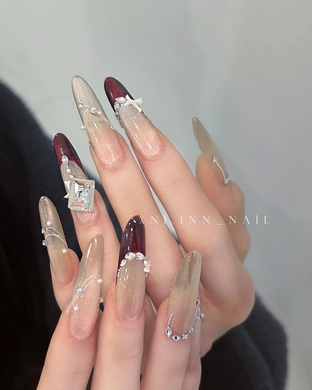 紅色貓眼法式造型排鑽款，美甲作品